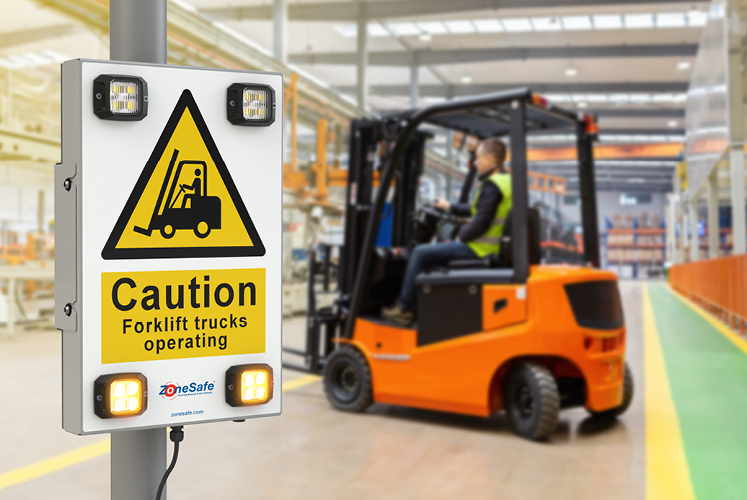 vehicle-activated-signage-in-warehouse-next-to-forklift